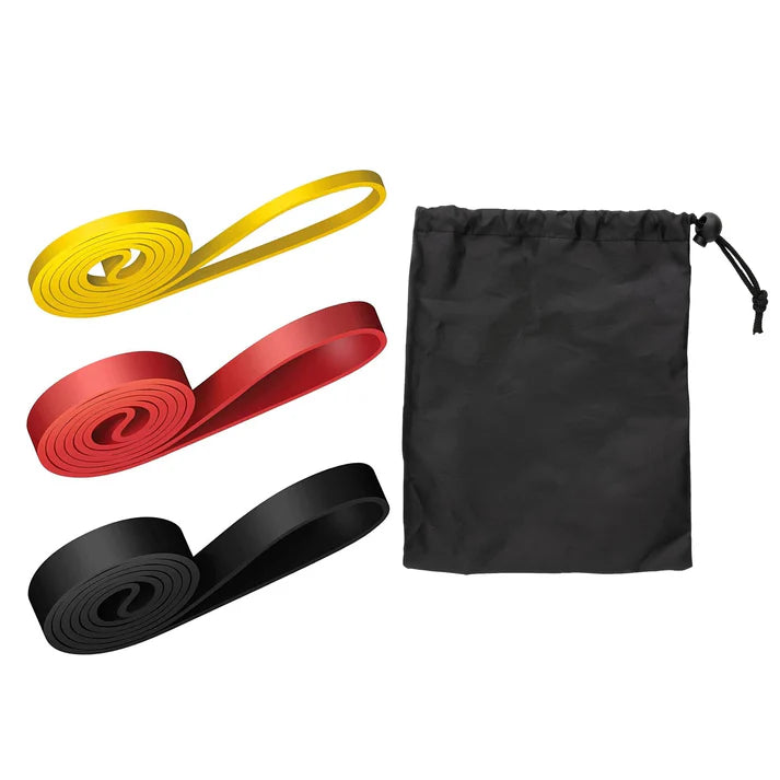 Three resistance bands in yellow, red, and black with a black drawstring bag on a white background.